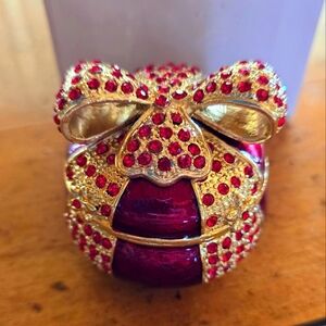 NEW in original box gold and red rhinestone bow encrusted trinket box.